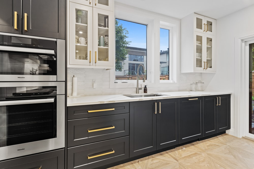 a black and white kitchen cabinetry theme